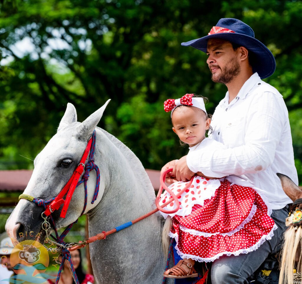 Father and Daughter on horseback in the Independence Day parade Uvita Costa Rica 2025 Padre e hija a caballo en el desfile del Día de la Independencia Uvita Costa Rica 2025